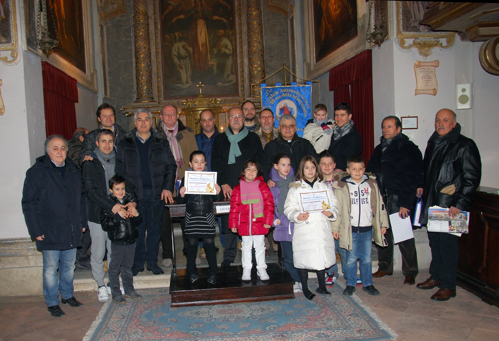 premiati e organizzatori dell’edizione 2011 con l’Arciprete don Enzo Nicolini